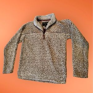 Gently worn fleece pullover in putty by True Grit.